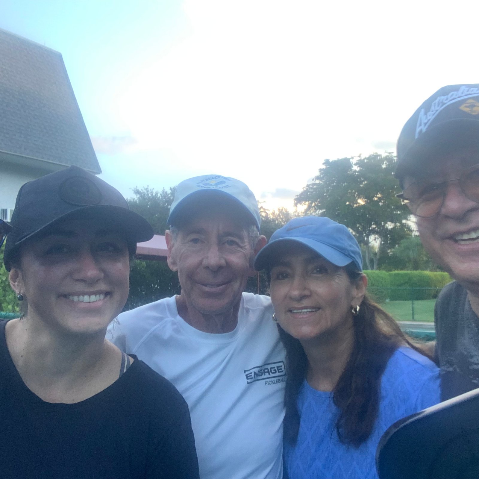 Bob teaching a beginners clinic to a family of four people