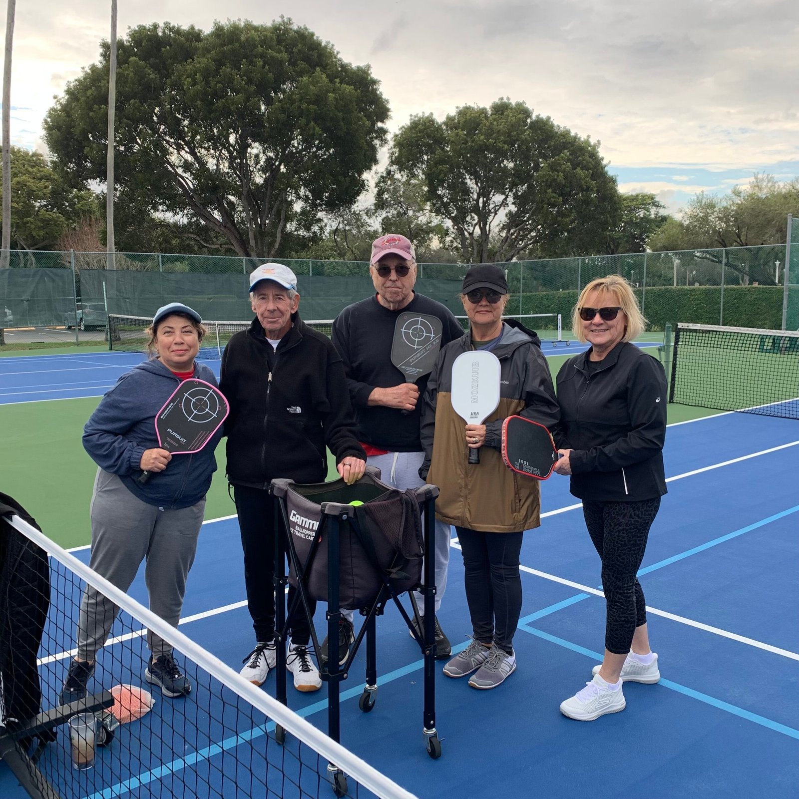 Alla, Bob, Nancy, and Rosemarie with Bob in a Beginners Pickleball Clinic in Delray Beach, FL