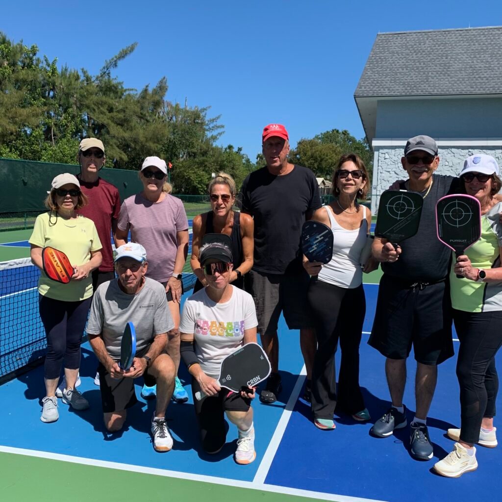 Bob Savar teaching a group of beginner pickleball players in Delray Beach, Florida